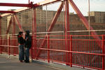 a couple on a bridge