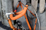 one orange bicycle